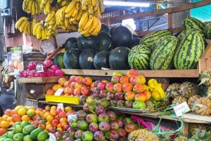 Colorful fruit and vegetable stalls at Port Louis Central Market
