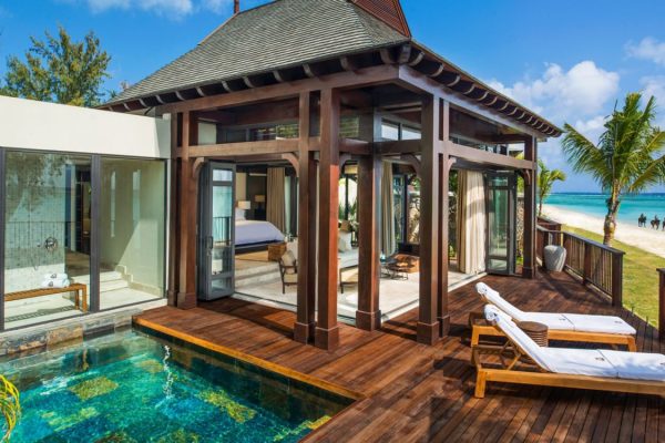 Elegant beachfront suite at JW Marriott Mauritius Resort with ocean views.
