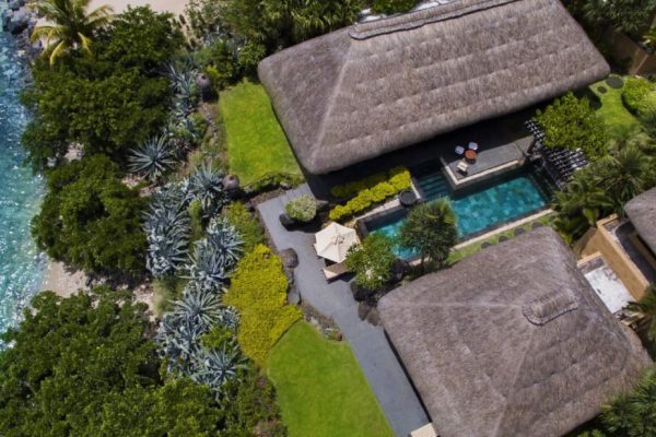 Luxurious private villa with a pool at The Oberoi Beach Resort in Mauritius.