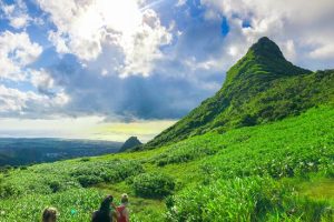 Hiker at the summit of Le Pouce Mountain